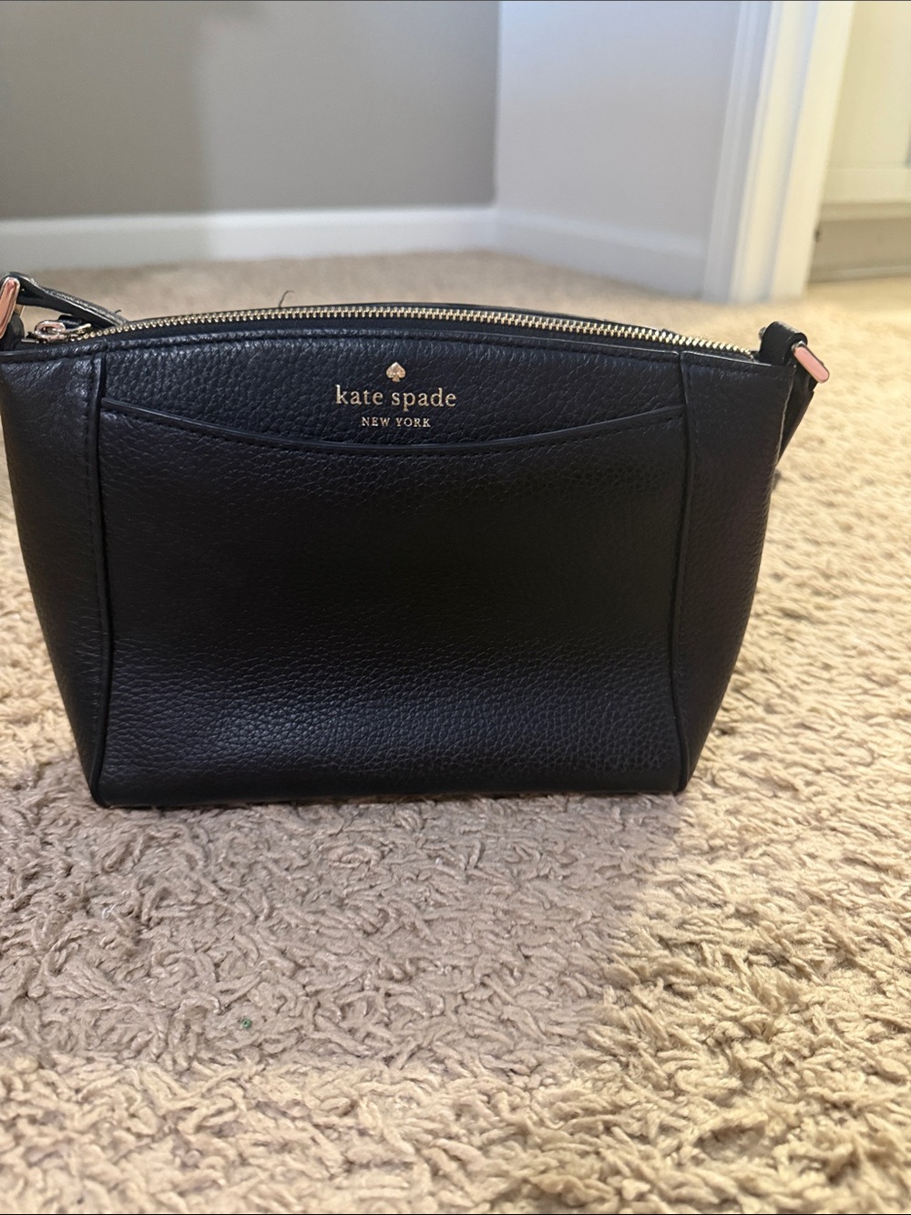 kate spade black pebbled leather crossbody with gold logo